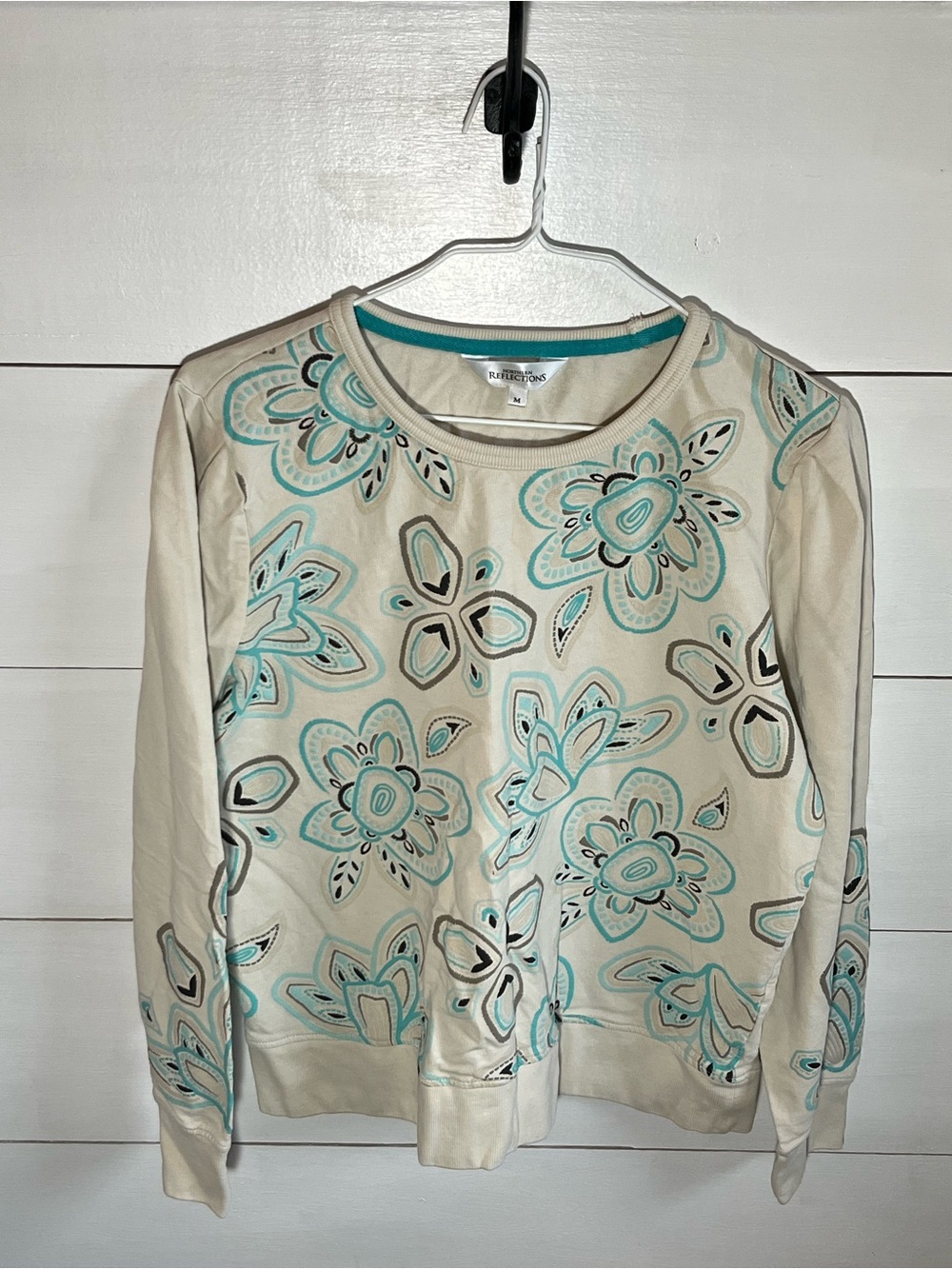 Northern Reflections Cream Sweatshirt with Teal Floral Print